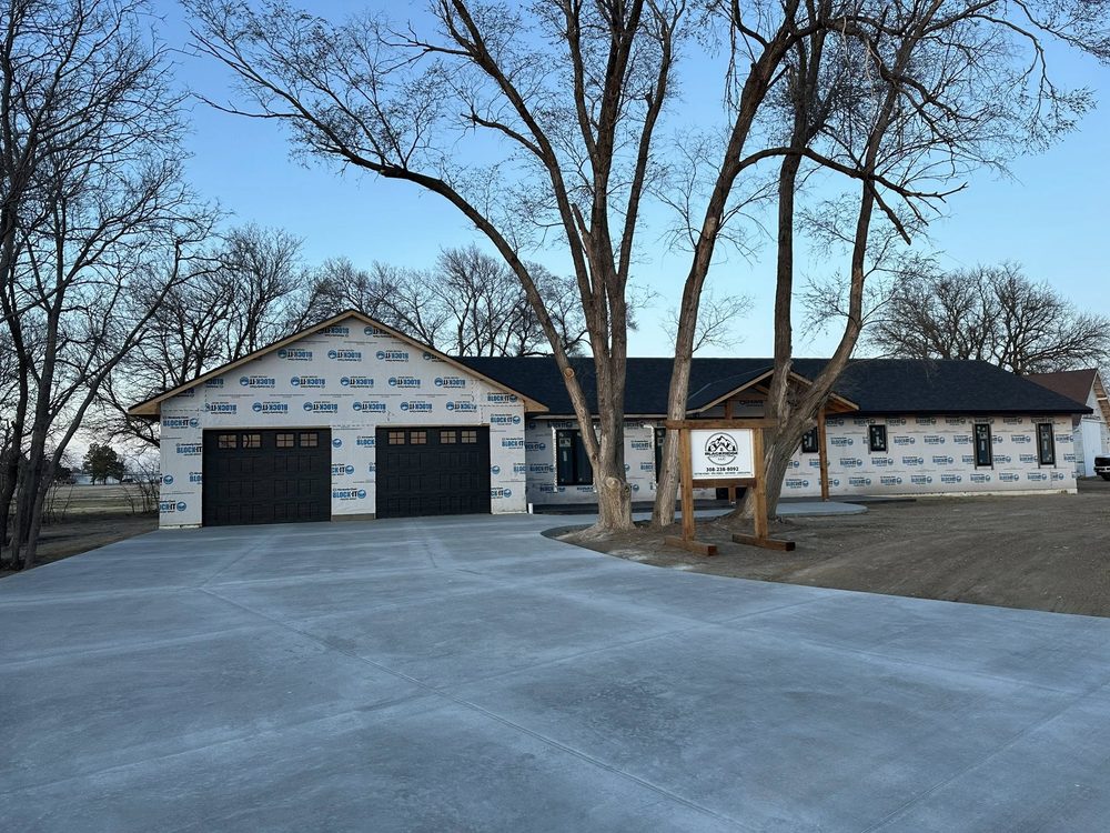 Custom home with BlackRidge sign installed on site