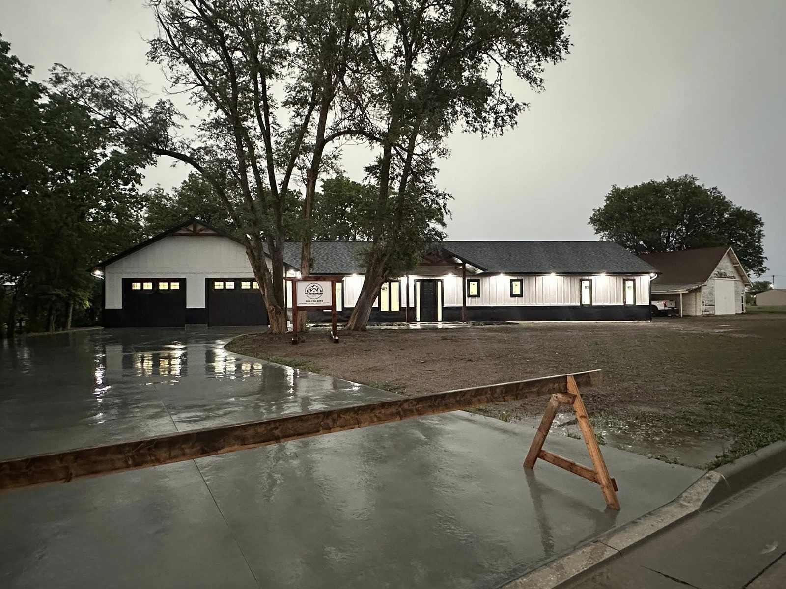 BlackRidge-built custom home in Kansas with finished Diamond Kote board and batten siding